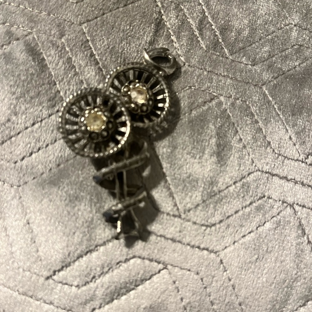 “Twin Helios” vintage brooch
